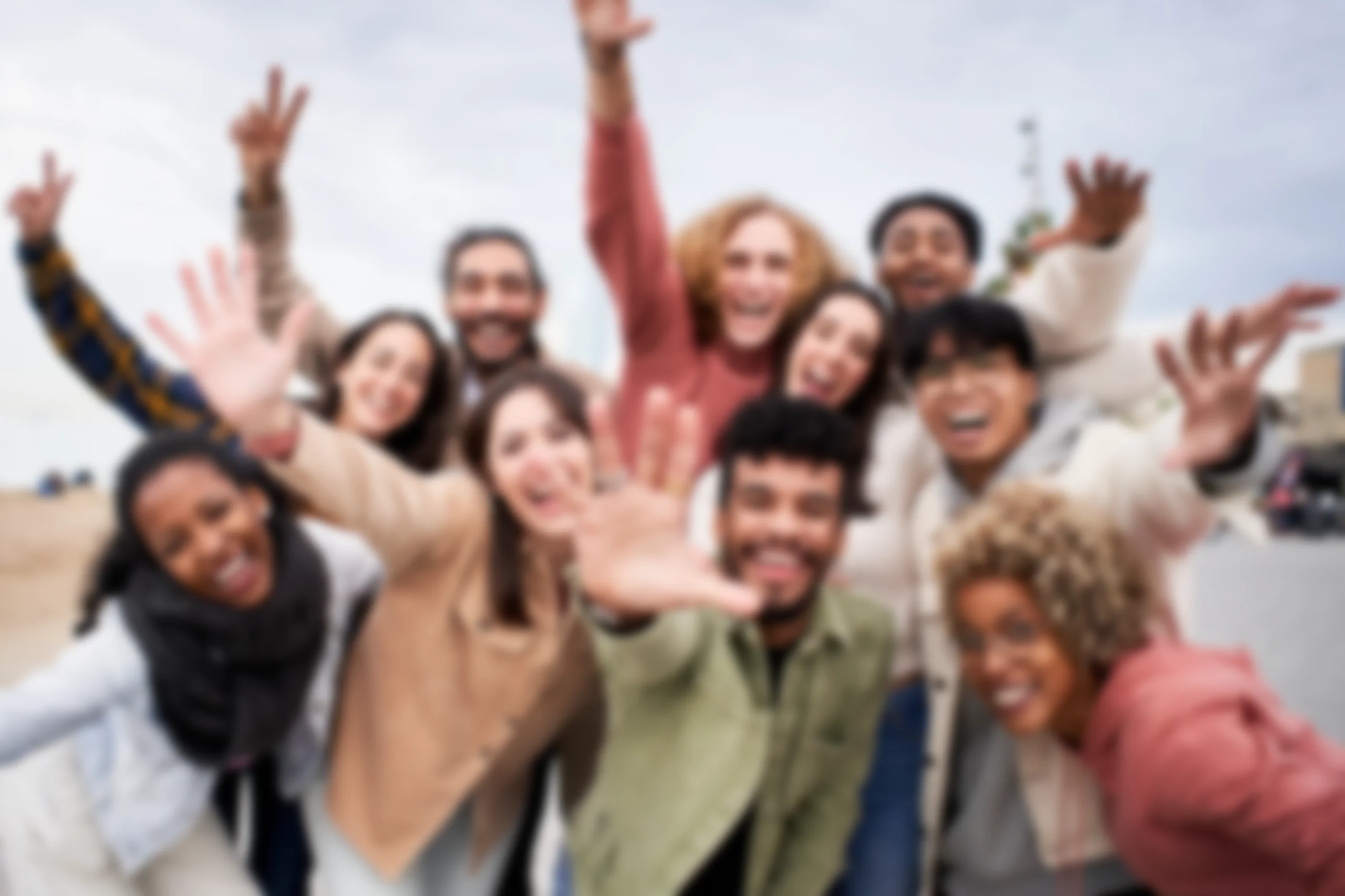 Group of people having fun together using Vidizzy video chat. 